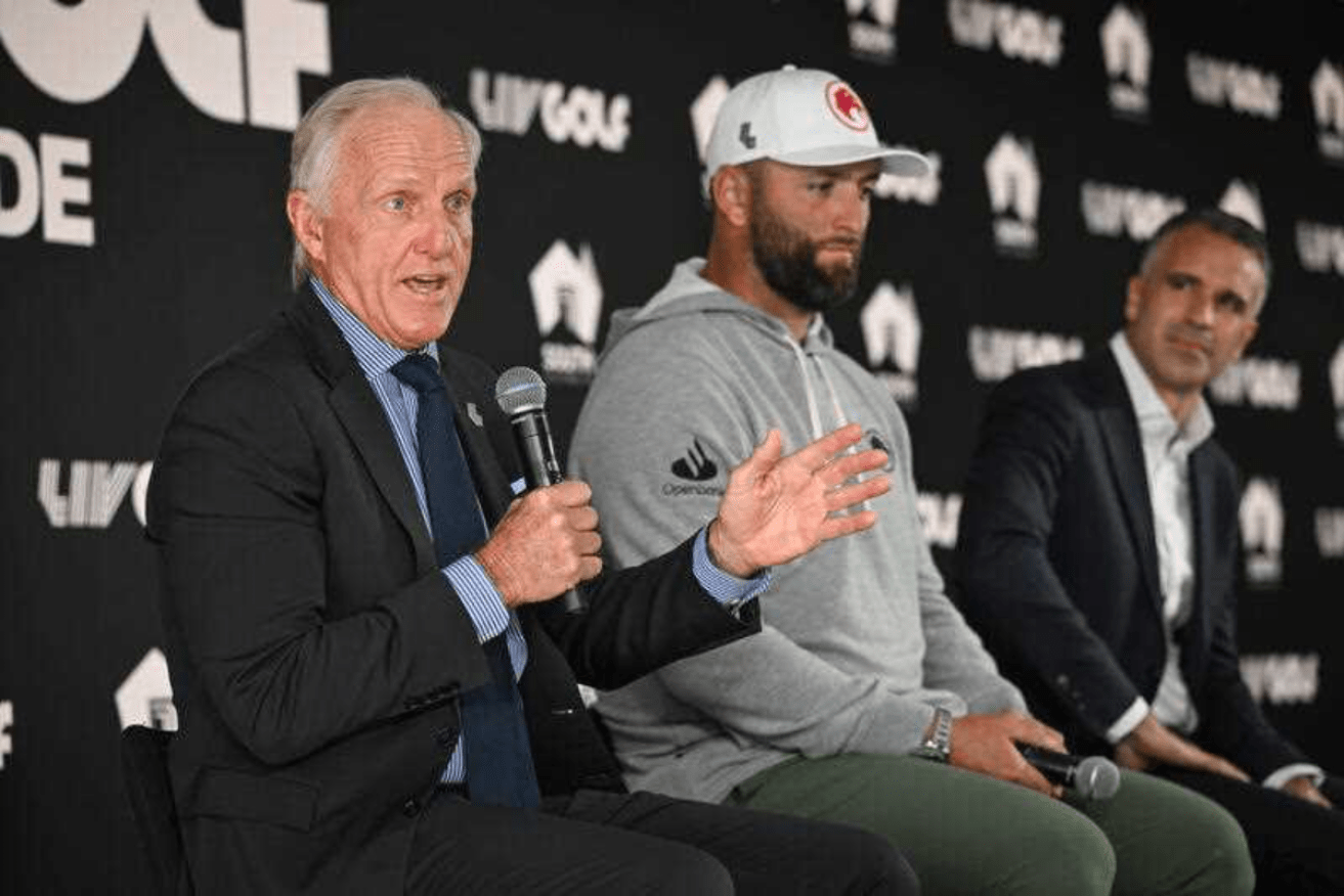 LIV Golf CEO Greg Norman speaks to media flanked by Legion XIII Captain Jon Rahm and Premier Peter Malinauskas during a press conference at the Grange Golf Club in Adelaide on Wednesday. Photo: AAP Image/Michael Errey