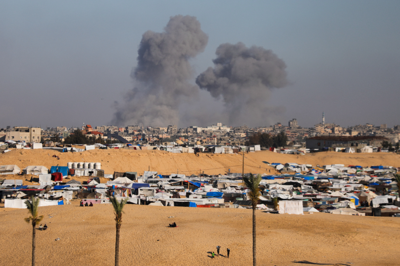 Smoke rises from an Israeli airstrike in Rafah on Monday. Photo: AP /Ismael Abu Dayyah