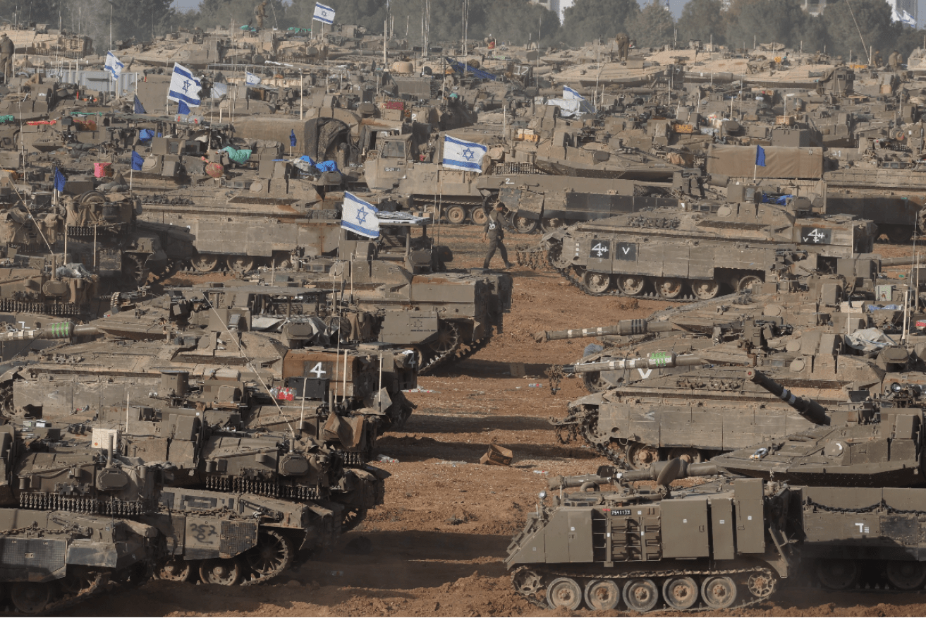 Israeli tanks and military vehicles at the Gaza Strip border with southern Israel on May 9. Photo: EPA