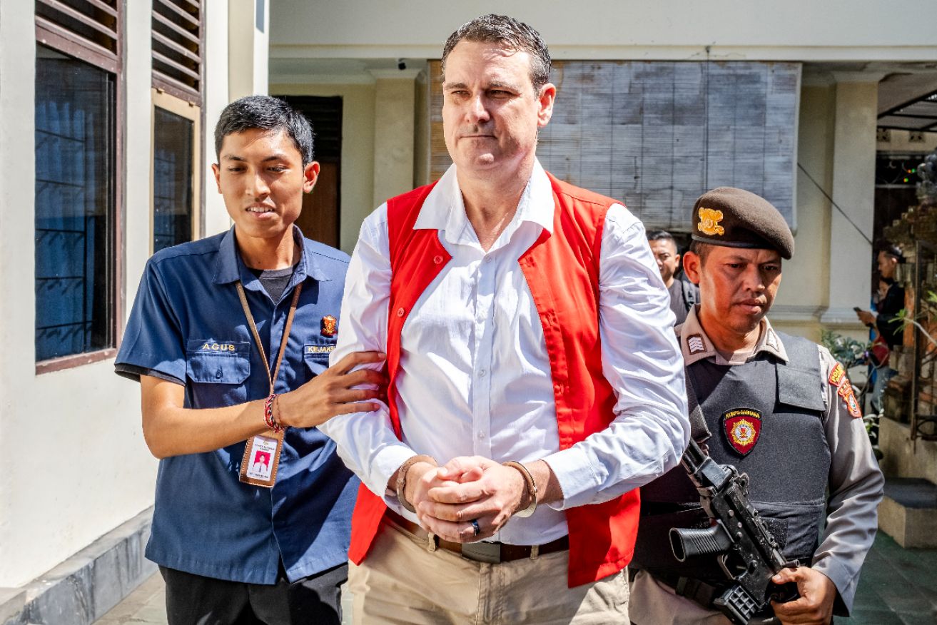 Troy Smith arrives at a Denpasar court for his trial. Photo: Made Nagi/EPA