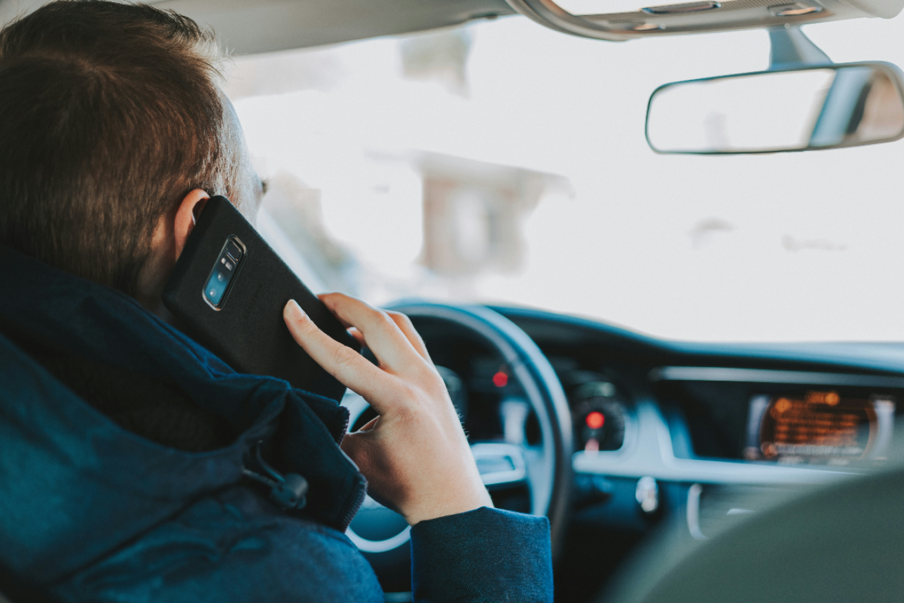 Mobile phone detection cameras will begin a three-month grace period today before drivers start receiving fines from September. Photo: Unsplash