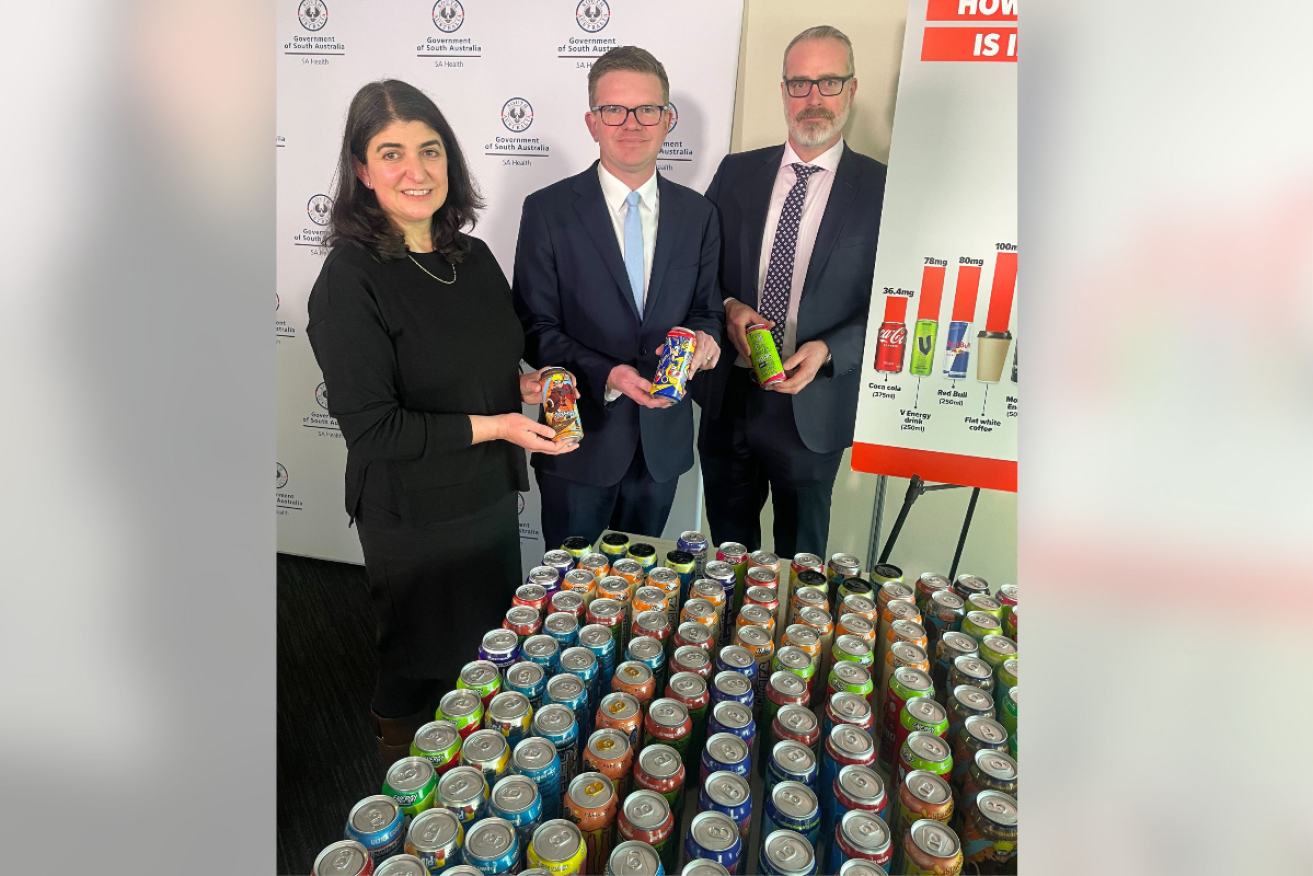 UniSA's Dr Evangeline Mantzioris, SA Health Minister Chris Picton and Acting SA Chief Public Health Officer Dr Chris Lease with some of the seized drinks. Photo: SA Health