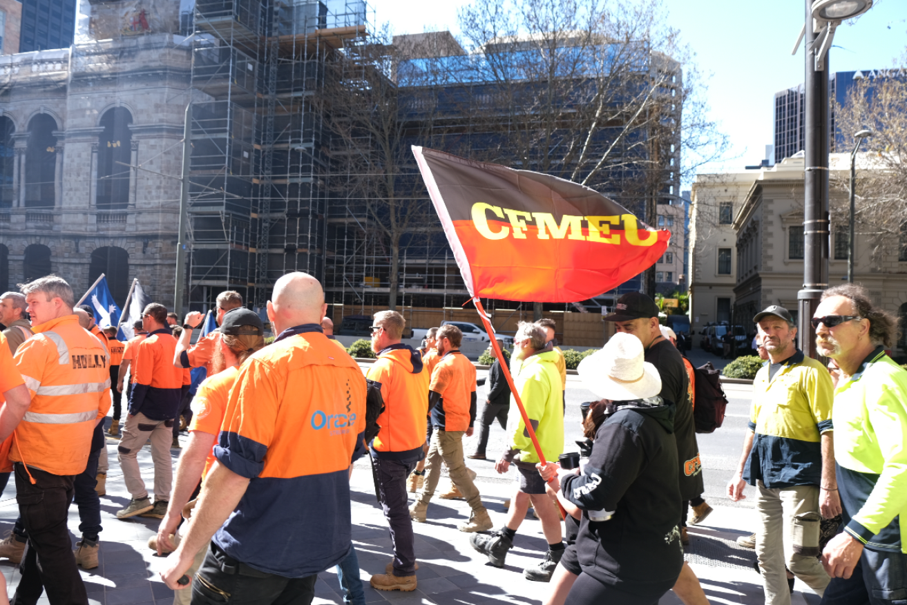 CFMEU members march in Adelaide to protest the union's being placed into administration last week. Photo: Claudia Dichiera/InDaily