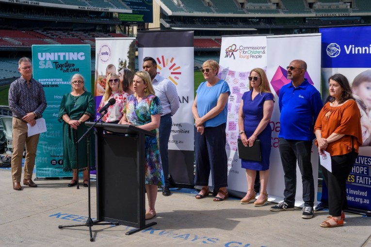 Adelaide Oval child poverty press conference (L-R) SACOSS CEO Ross Womersley; Women in Poverty Network CEO Aradia Sayner; Single Mother Families Australia CEO Terese Edwards; Uniting SA CEO Jenny Hall, CEO Lutheran Care CEO SA/NT Rohan Feegrade; Commissioner for Children and Young People SA Helen Connolly; Baptist Care SA CEO Sue Raw; Uniting Country SA CEO Dr Harry Randhawa, and Vinnies SA CEO Evelyn O’Loughlin.